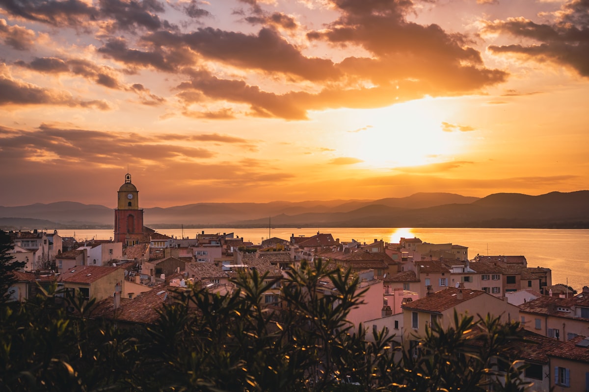 Sunset over the village of Boccadasse with golden light on the houses