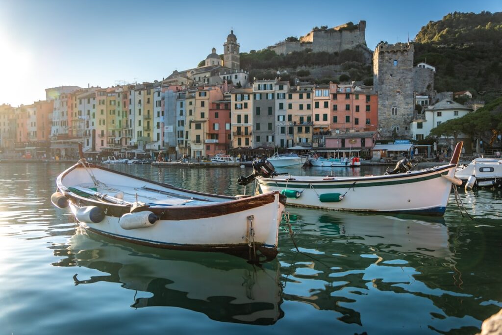 The golden sunset illuminates Portofino's houses creating magical reflections