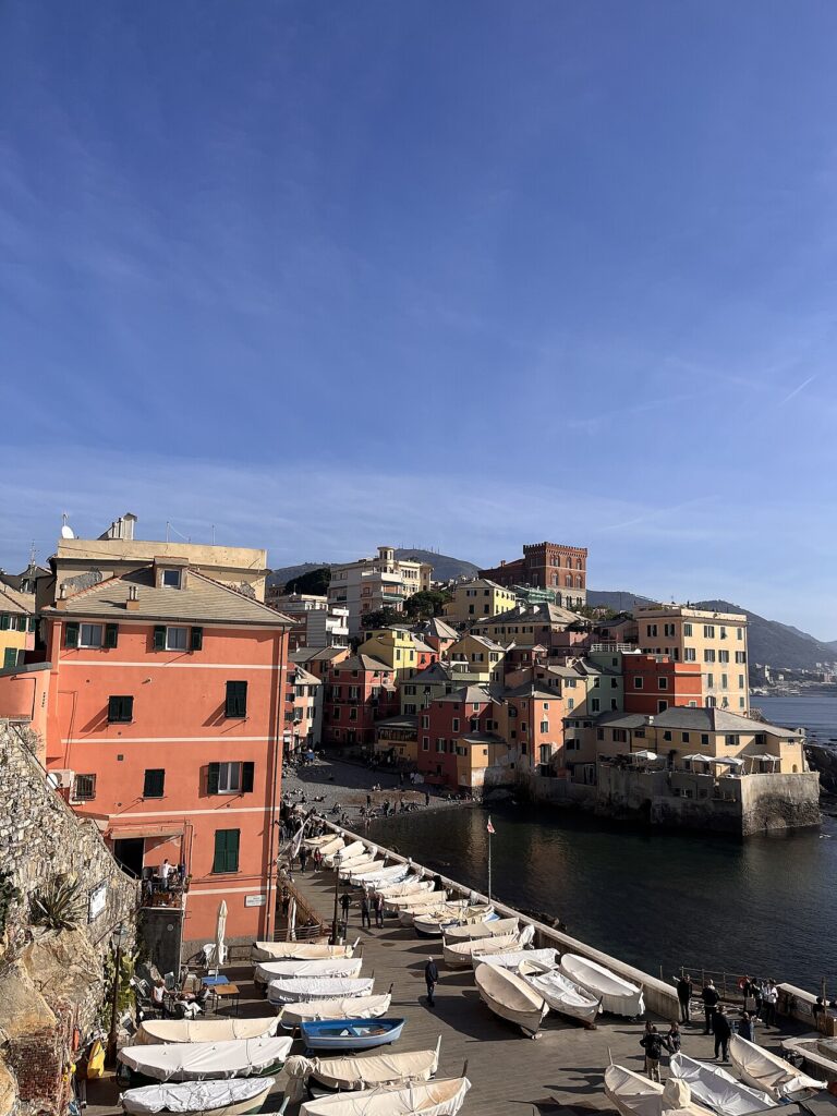 Boccadasse, the fishermen's village of Genoa, with its colorful houses and boats on the pebbly beach