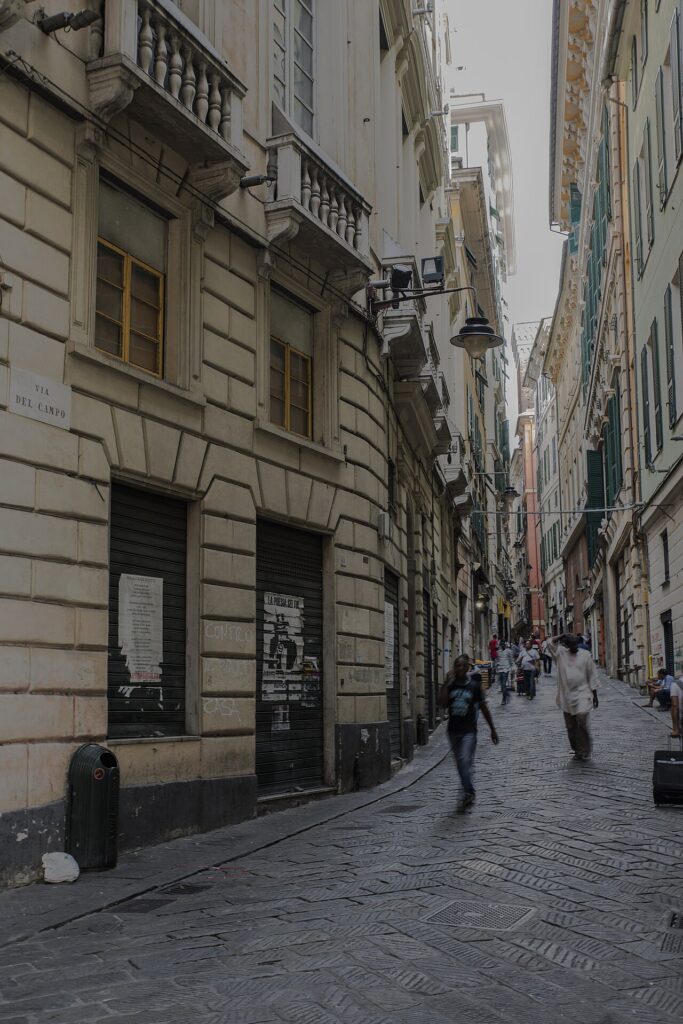 The characteristic caruggi of Genoa's historic center during Easter