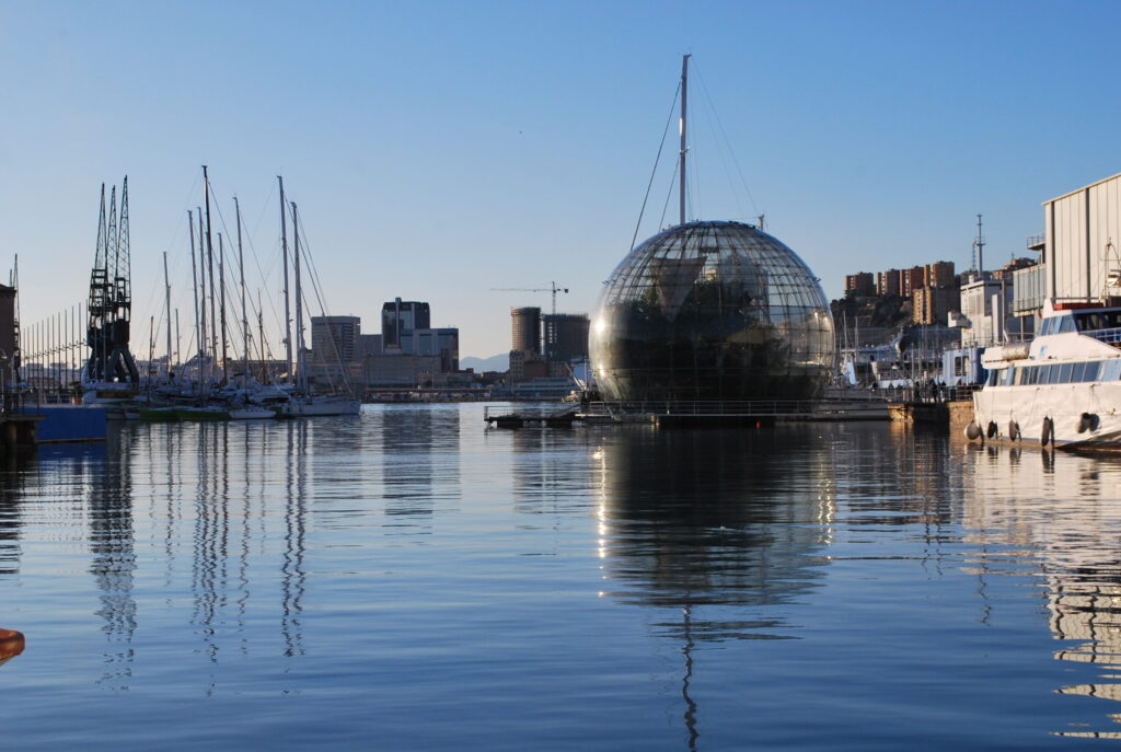 The Biosphere by Renzo Piano in Genoa's Porto Antico: the Bigo–Aquarium–Biosphere complex is central to the city's tourist demand