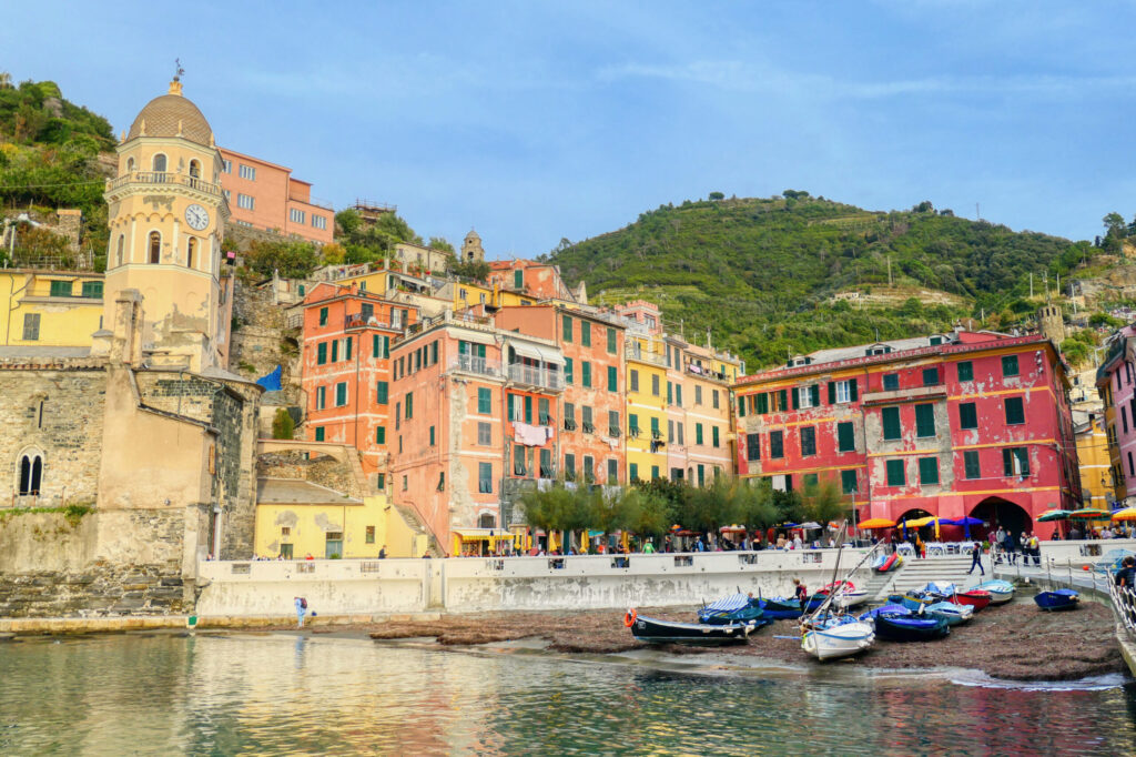 The village of Vernazza seen from the sea with colorful houses and the harbor