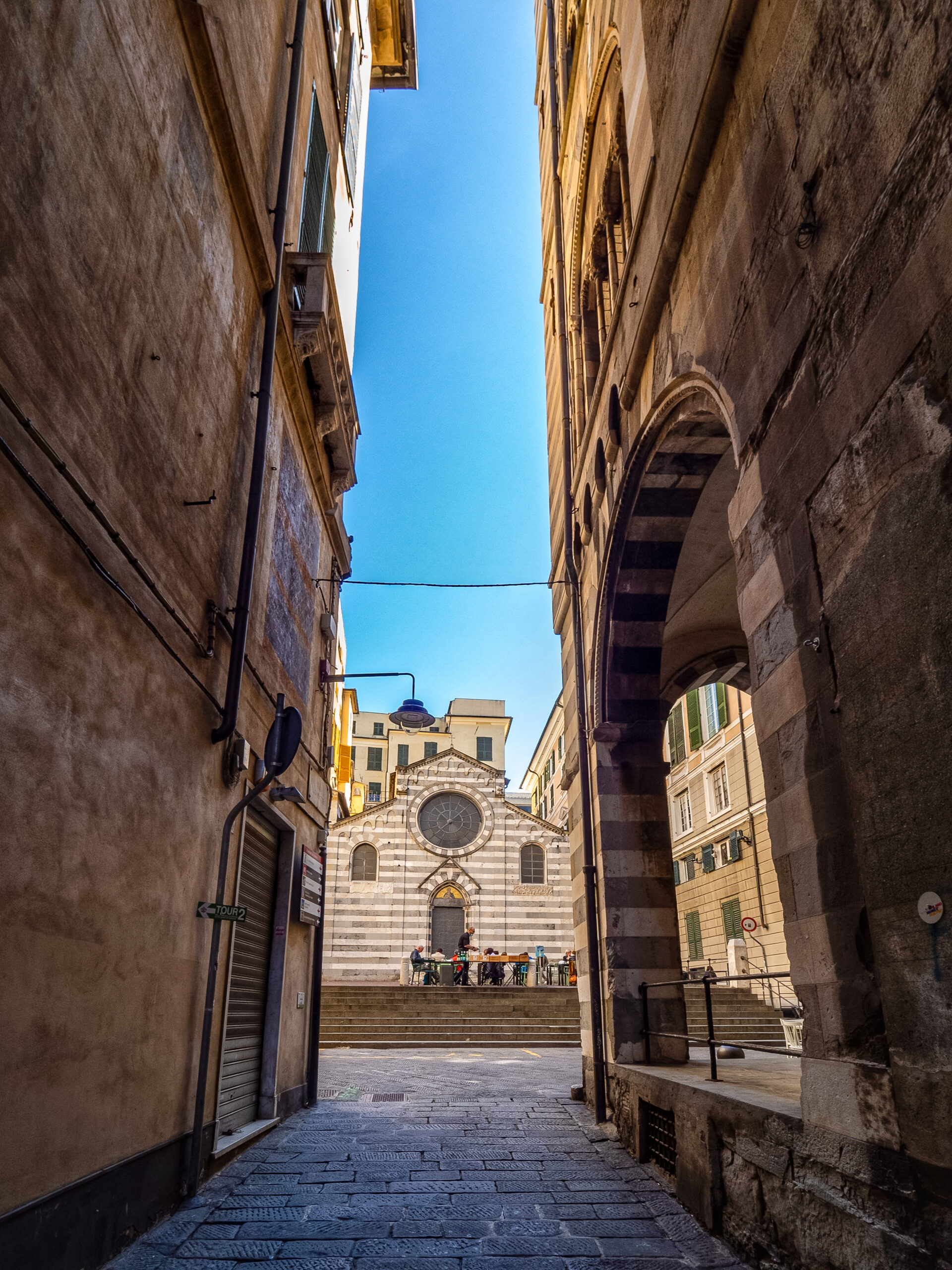 San Matteo church seen through a medieval alley of Genoa's historic centre