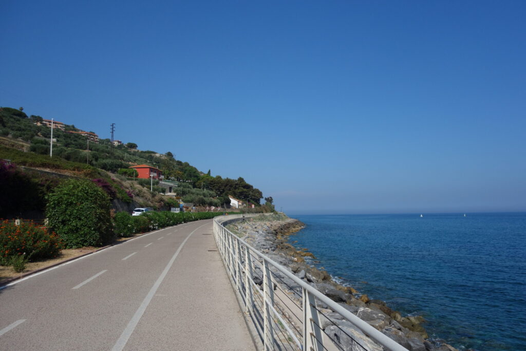 Cycle path of the Ligurian Riviera between sea and Mediterranean scrub