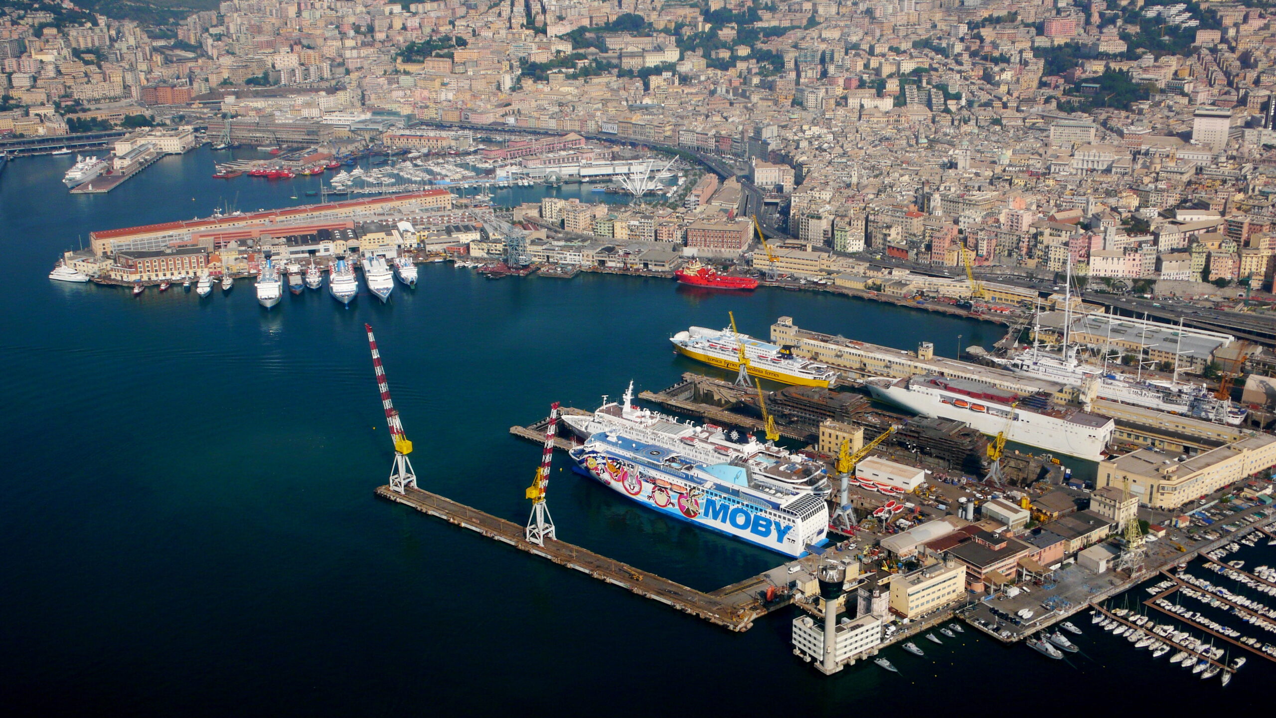 Aerial view of Porto Antico in Genoa with the old town