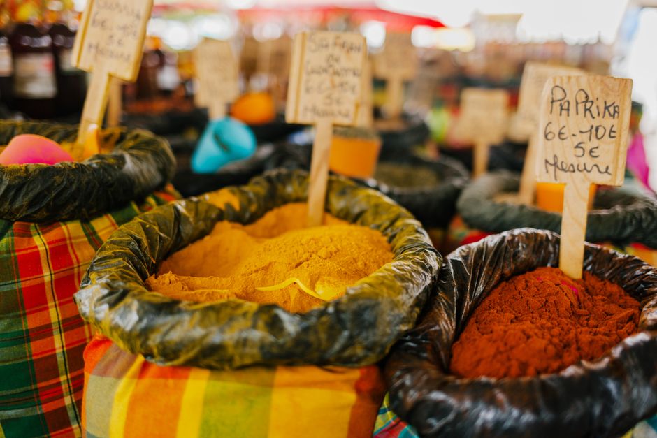 Sacks of colorful spices in a traditional market