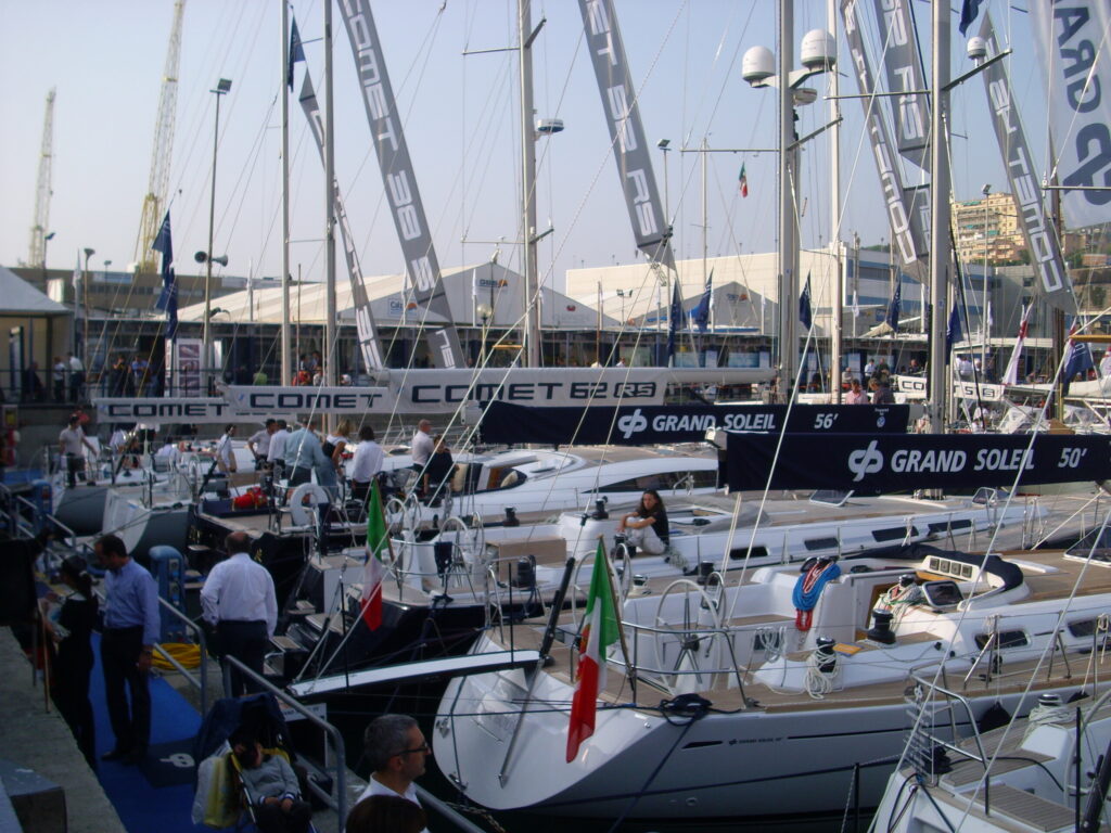 Exhibitors and visitors among the boats at the Genoa International Boat Show
